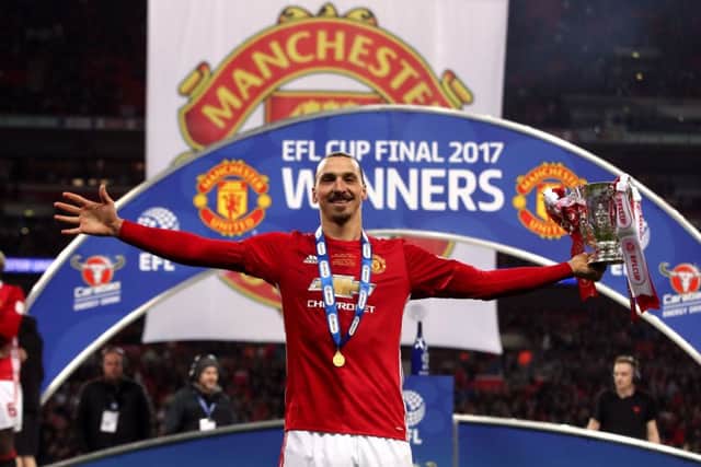 Manchester United's Zlatan Ibrahimovic with the trophy after the EFL Cup Final at Wembley Stadium, London. PRESS ASSOCIATION Photo. Picture date: Sunday February 26, 2017. See PA story SOCCER Final. Photo credit should read: Nick Potts/PA Wire. RESTRICTIONS: EDITORIAL USE ONLY No use with unauthorised audio, video, data, fixture lists, club/league logos or "live" services. Online in-match use limited to 75 images, no video emulation. No use in betting, games or single club/league/player publications.