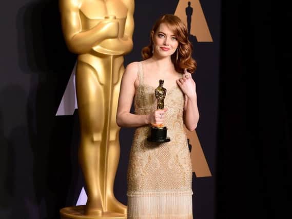 Emma Stone with the award for Best Actress for La La Land