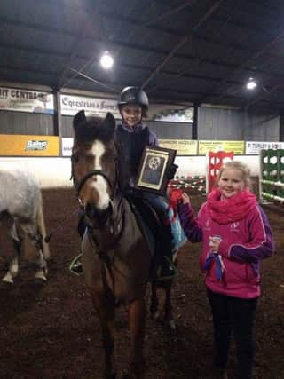 Taylor McKnight on Candypops winning the Churchill Plaque in the 80cms class with Caitlyn Patterson