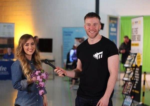 Emma Sinnamon demonstrating her floristry skills to BBC presenter, David Monahan at the Make it event
