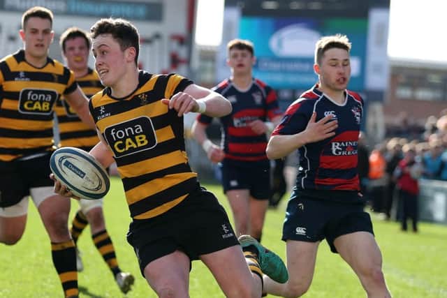 RBAI  Niall Armstrong   scores a try against Ballymena Academy