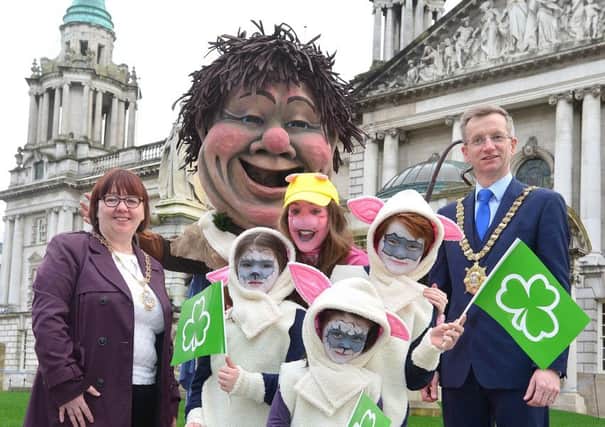 Belfast Lord Mayor Alderman Brian Kingston and Deputy Lord Mayor Cllr Mary Ellen Campbell are pictured with Beat Carnival performers Matt Vernon (St Patrick), Jazzmin McClure (Pig), Dara Brennan (Sheep), Sadbh Brennan (Sheep), Ailbhe Brennan (Sheep) ahead of Belfasts St Patricks Day celebrations on Friday March 17
