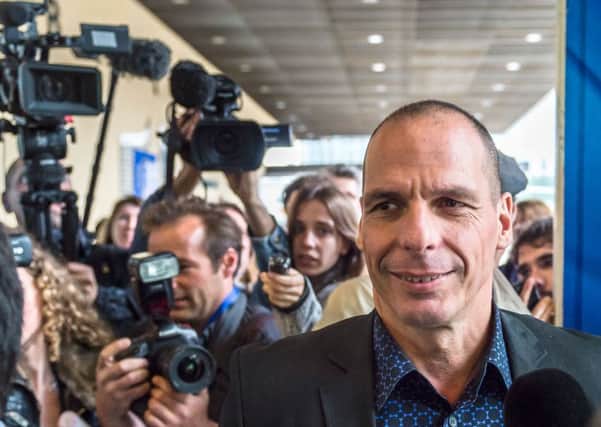 Greece's then finance minister Yanis Varoufakis arrives for crisis talks with an EU Commissioner at the European Commission headquarters in Brussels on May 5, 2015. . (AP Photo/Geert Vanden Wijngaert)