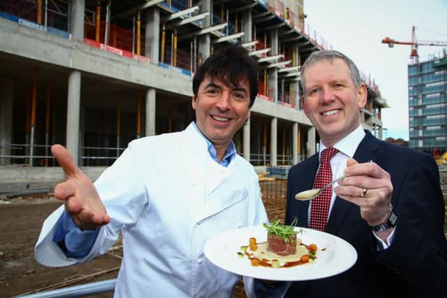 Chef Jean-Christophe Novelli outside the hotel site with Belfast Harbours property director Graeme Johnston