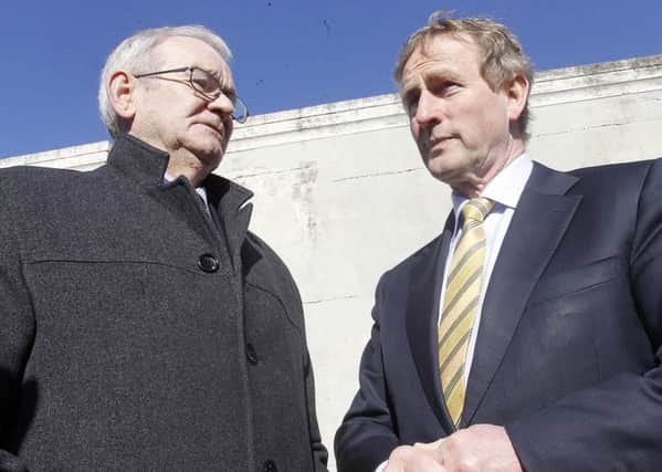 Enda Kenny (right) promised Kingsmills survivor Alan Black disclosure on security files when they met in 2015