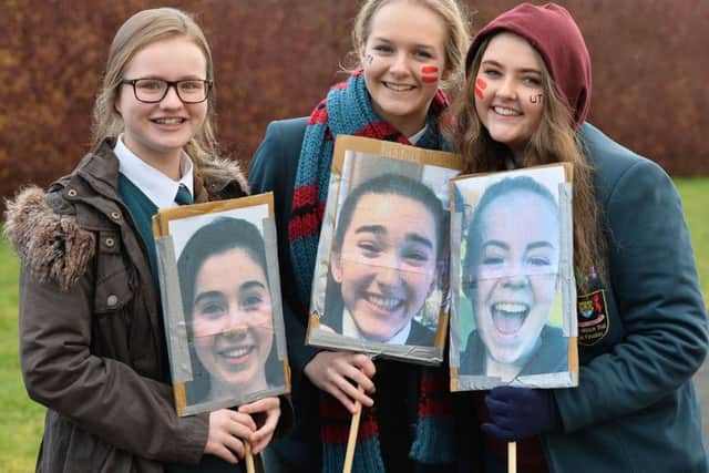 Academy fans show their support for their favourite players.
