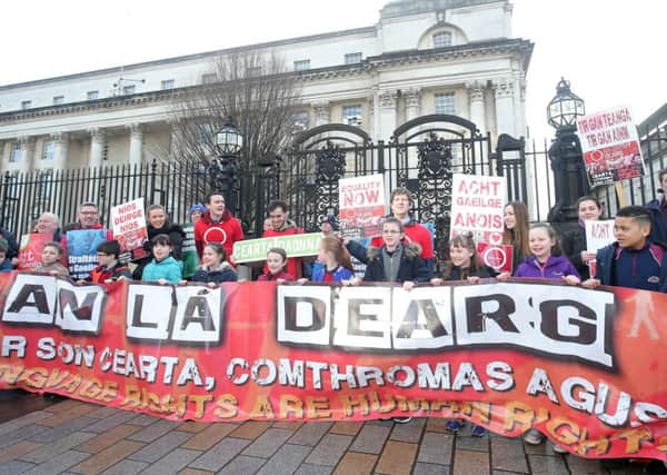 Irish speakers protest outside the High Court before an earlier hearing last month