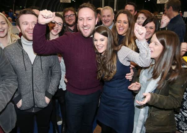 Alliance supporters cheer on candidate for East Belfast Chris Lyttle celebrates after he is elected on Friday. 

Photo by Jonathan Porter / Press Eye.