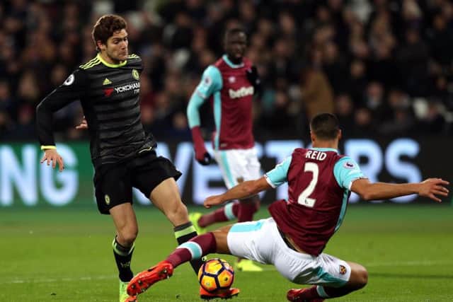 Chelsea's Marcos Alonso and Winston Reid