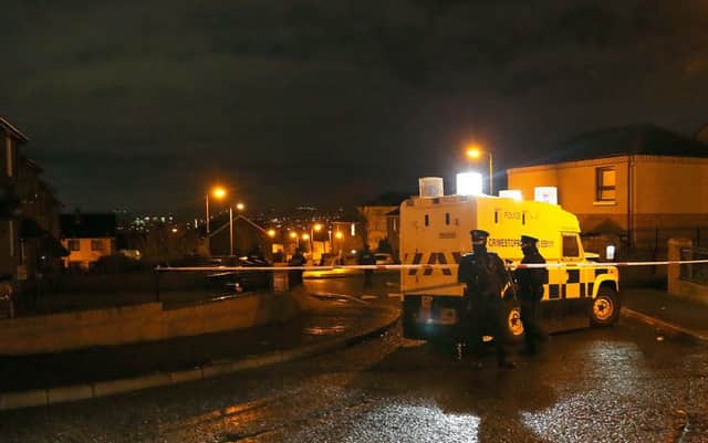 PACEMAKER BELFAST 27/11/2015 
Police say they are treating a gun attack on officers in west Belfast, in which up to eight shots were fired, as attempted murder.