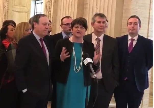 Arlene Foster with her MLAs at Stormont yesterday