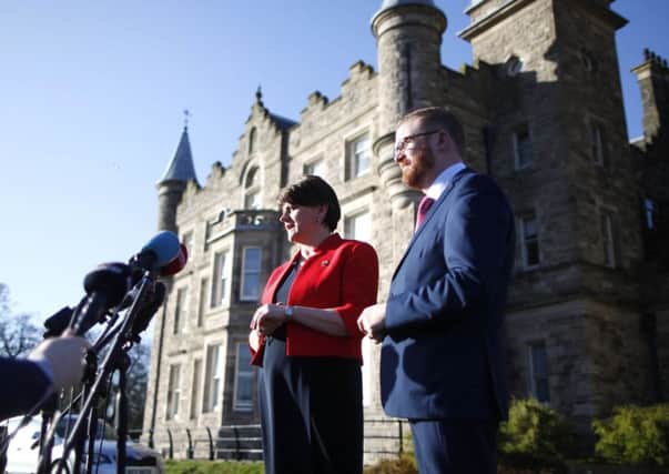 Arlene Foster and Simon Hamilton speak to the media at Stormont Castle after Wednesdays talks