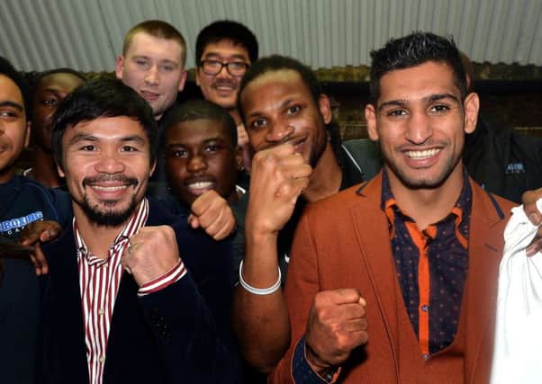 Amir Khan and Manny Pacquiao