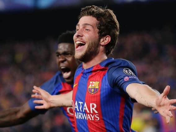 Barcelona's Sergi Roberto celebrates after scoring the sixth goal during the Champions League round of 16, second leg match against Paris Saint Germain