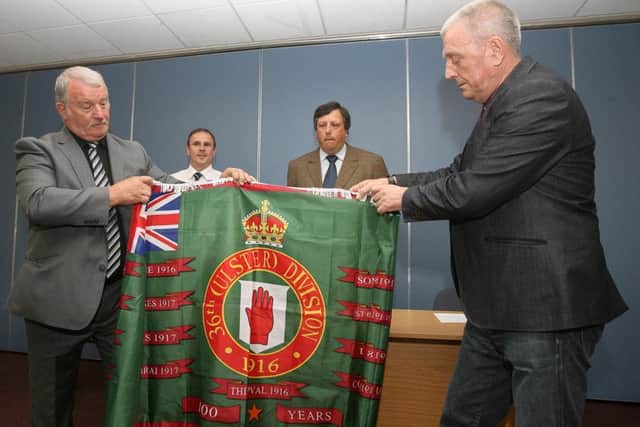 David Campbell, background right, at the 2016 unveiling of a new flag by the Loyalist Communities Council for the centenary of the Battle of the Somme. With from left Jim Wilson, Winston Irvine, and Jackie McDonald.
Picture by Pacemaker Press, Belfast