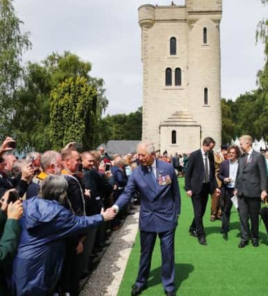 The Prince of Wales greets members of the public at the Ulster Memorial Tower in Thiepval, France, following a service to mark the 100th anniversary of the start of the battle of the Somme. Photo: Niall Carson/PA Wire