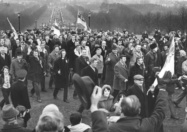 A United Ulster Unionist Council victory march to Stormont led by Harry West, Ian Paisley and Bill Craig in 1974