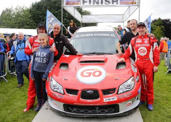 Winners Garry Jennings and Michael Moran during winners presentations at the Lurgan Park Rally in 2016