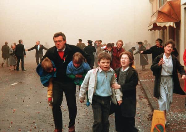 The IRA massacre at the Remembrance Day service in Enniskillen in 1987 which killed 11 people who were standing in and around the area. Picture by Pacemaker