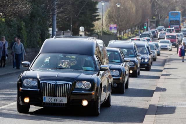 The funeral cortege for the funerals of pregnant mother Annmarie O'Brien, daughter Paris and Holly and Jordan O'Brien who died in a fire arriving at St Anne's Church, Shankill, Dublin