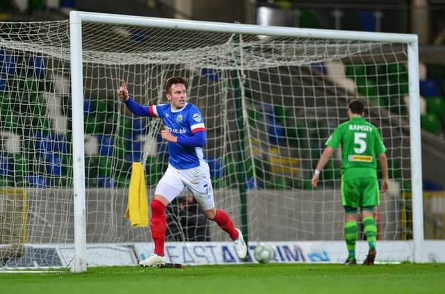 Linfield's Andy Waterworth celebrates making it 2-0 against Clinftonville