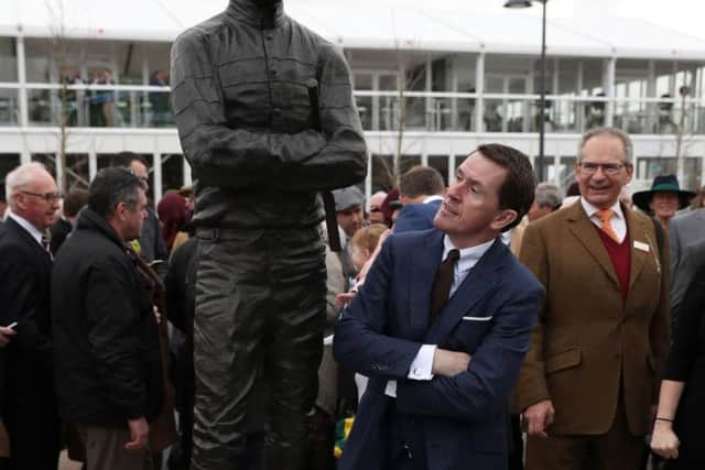 AP McCoy unveils a statue of himself during Champion Day of the 2017 Cheltenham Festival at Cheltenham Racecourse.