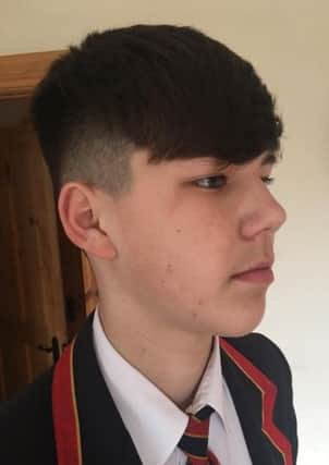 Henry Miskmmin, 14, was put in 'isolation' by Enniskillen Royal Grammar School for this haircut, his Mum Sandra said.