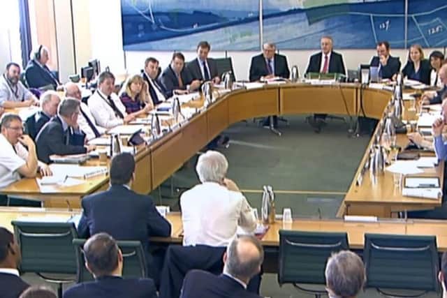 Brexit Secretary David Davis gives evidence to the Brexit Select Committee in the House of Commons, London.