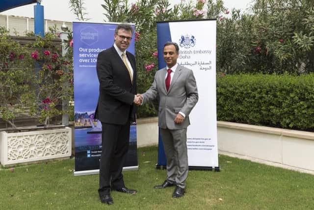 Alastair Hamilton, left, with UK Ambassador to Qatar, Mr Ajay Sharma