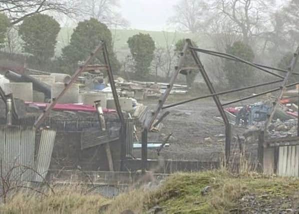 The scene of the shed blaze that destroyed eight biomass boilers and tonnes of woodchip near Enniskillen