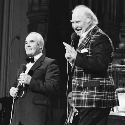 Joe at a concert in Londonderry's Guildhall in the 1980s. Behind him is William Loughlin, another acclaimed local singer.