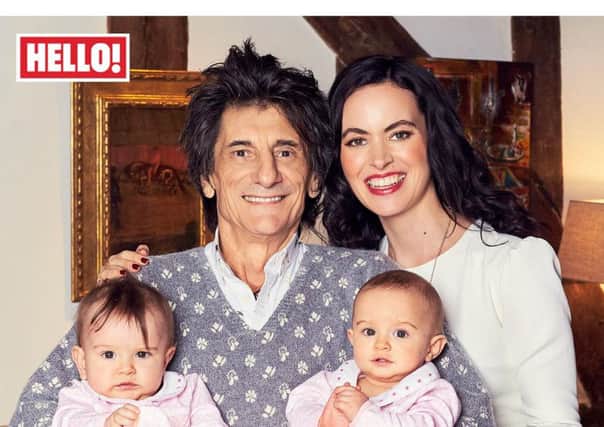 Hello!handout photo of Ronnie and Sally Wood with their nine-month-old twin daughters  Gracie and Alice (left to right not given) as they appear in this week's edition of the magazine.