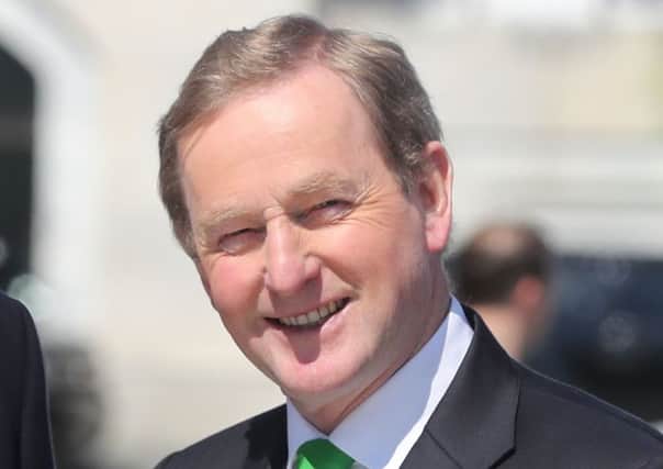 Taoiseach Enda Kenny claimed there was an agreement with Theresa May over no return of direct rule