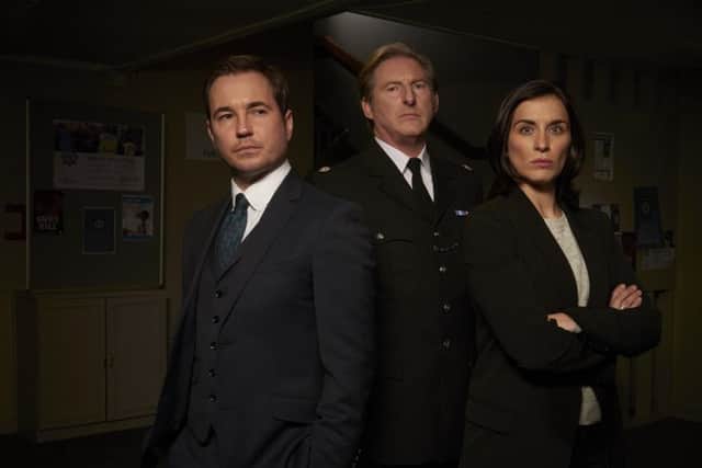 Detective Sergeant Steve Arnott (played by Martin Compston), Superintendent Ted Hastings (Adrian Dunbar) and Detective Sergeant Kate Fleming (Vicky McClure). Photographer: Des Willie.