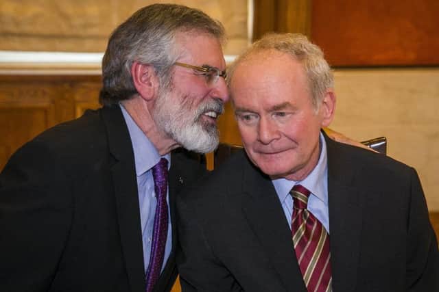 Sinn Fein leaders Gerry Adams with the late Martin McGuinness