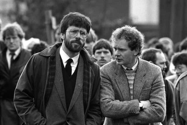 Gerry Adams and  Martin McGuinness at the funeral of Patrick Kelly, 30, a reputed IRA commander in East Tyrone. PRESS ASSOCIATION Photo.