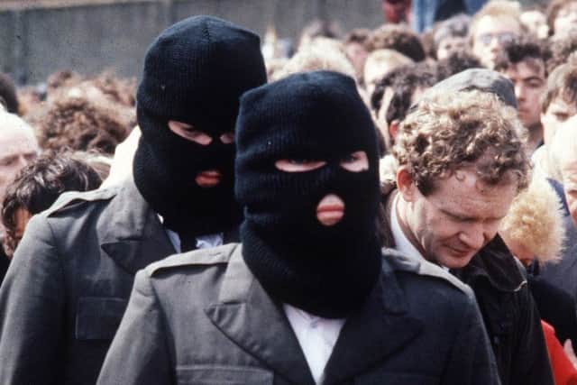 August 1985: Funeral of IRA man Chuck English. Pictured, right, is Martin McGuinness.