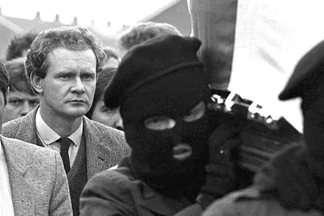 Martin McGuinness (left) follows the coffin of IRA man Charles English in Londonderry in 1984 PACEMAKER BELFAST