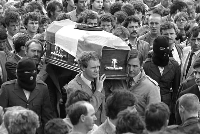 Martin McGuinness carrying the coffin of dead IRA man Charles English in August 1985, with others including Martin Galvin. Picture Pacemaker