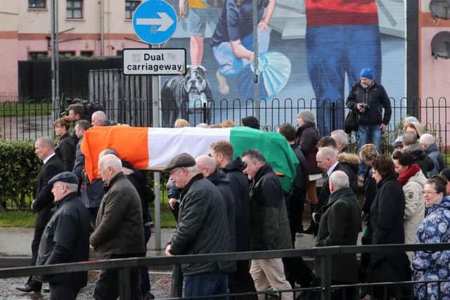 The coffin of Northern Ireland's former deputy first minister and ex-IRA commander Martin McGuinness is carried to his home in Londonderry after he died aged 66.