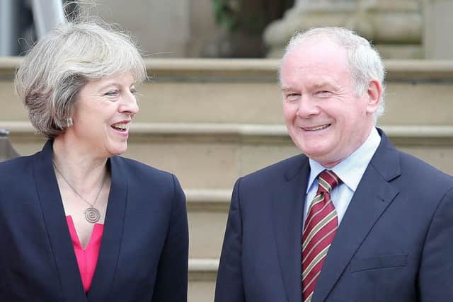 Prime Minister Theresa May pictured with then deputy First Minister Martin McGuinness at Stormont Castle, Belfast, during her first official visit to Northern Ireland back in July