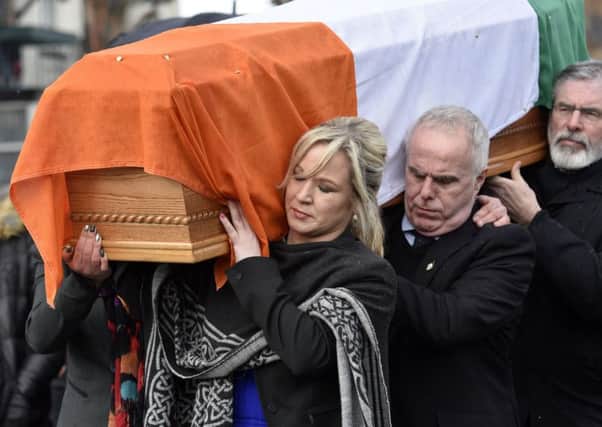 Sinn Fein's Michelle O'Neill carries the coffin of Martin McGuinness. DER1217-145KM