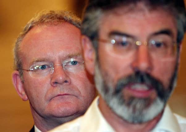 Sinn Fein's Martin McGuinness (left) and Gerry Adams.