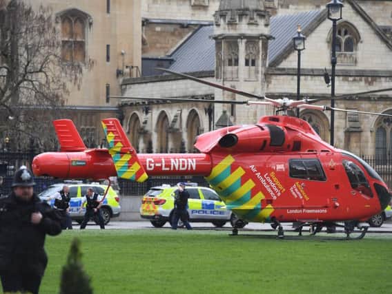 An Air Ambulance outside the Palace of Westminster, London, after sounds similar to gunfire have been heard close to the Palace of Westminster