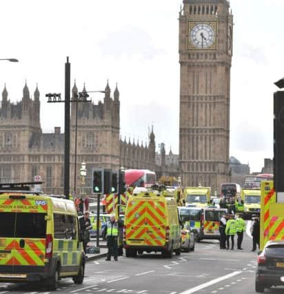 Emergency personnel on Westminster Bridge, close to the Palace of Westminster, London, after a policeman has been stabbed and his apparent attacker shot by officers in a major security incident at the Houses of Parliament. PRESS ASSOCIATION Photo.