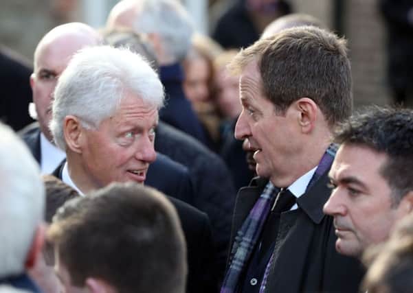 Former US President Bill Clinton speaks with Alastair Campbell after the funeral of Northern Ireland's former deputy first minister and ex-IRA commander Martin McGuinness at St Columba's Church Long Tower, in Londonderry. Photo: Niall Carson/PA Wire