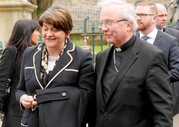 Arlene Foster and Bishop John McKeown arrive for the funeral  at St Columbas Church Long Tower, in Londonderry