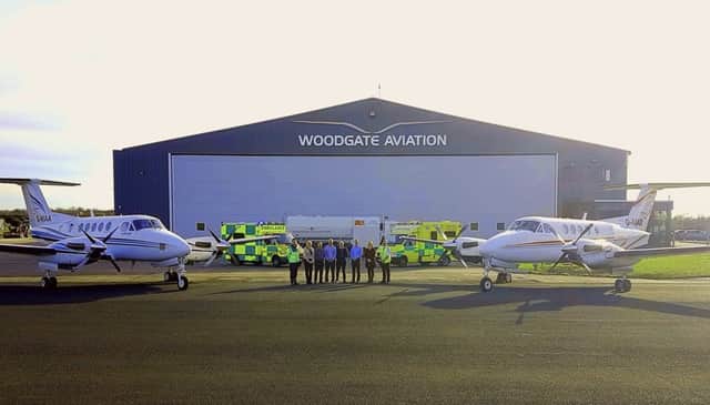 Woodgate Aviations Air Ambulance aircraft and aeromedical staff at the companys hangar at Belfast international Airport