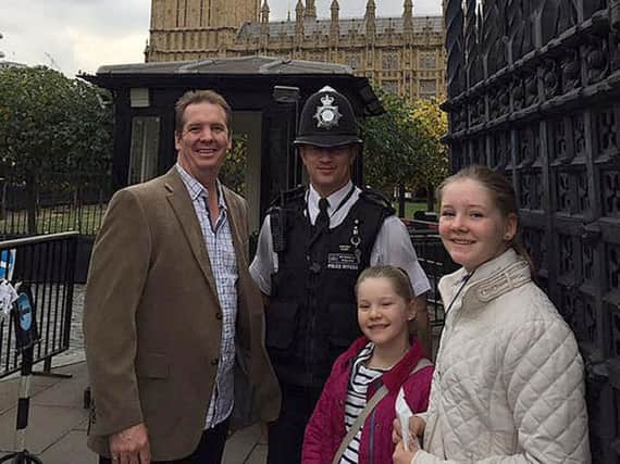 Handout photo of Australian Andrew Thorogood, 41, and daughters Alexsandra, 12, and Georgia, 9, with Pc Keith Palmer in October 2016.