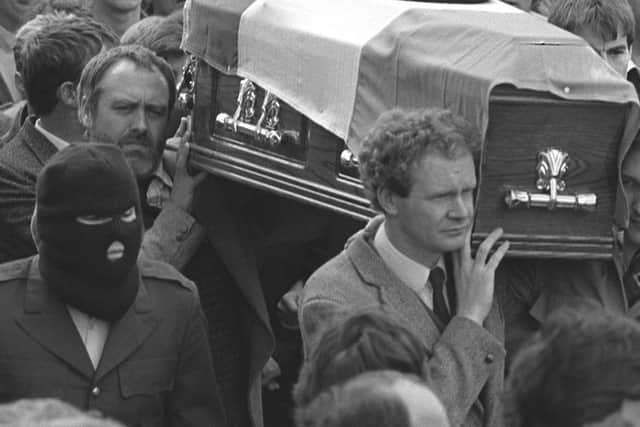 Martin McGuinness in Londonderry helping carry the coffin of IRA man Charles English in 1985. Picture Pacemaker